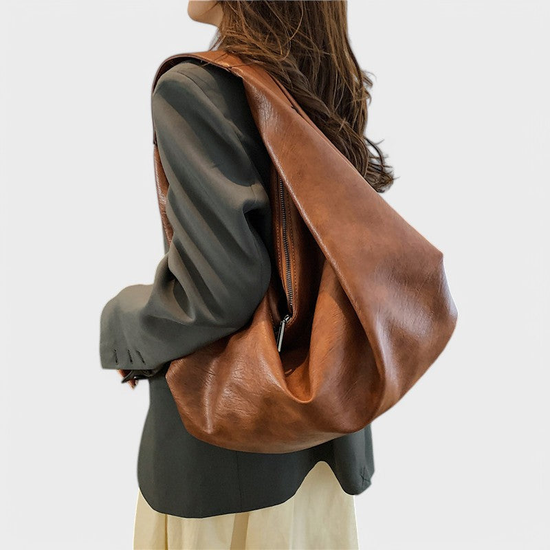 Nora. - Borsa Hobo triangulaire spaziosa