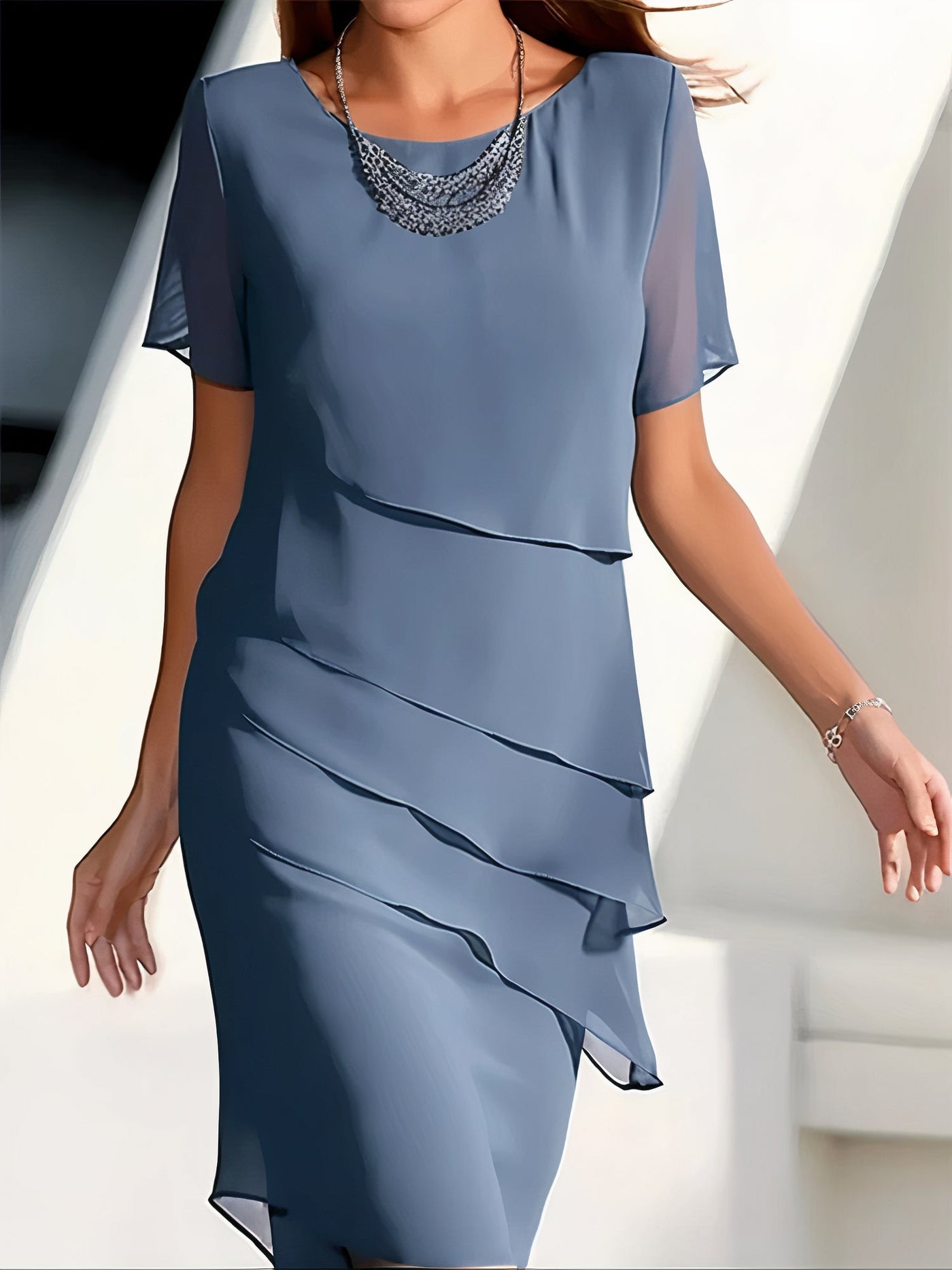 Robe plissée en mousseline de soie